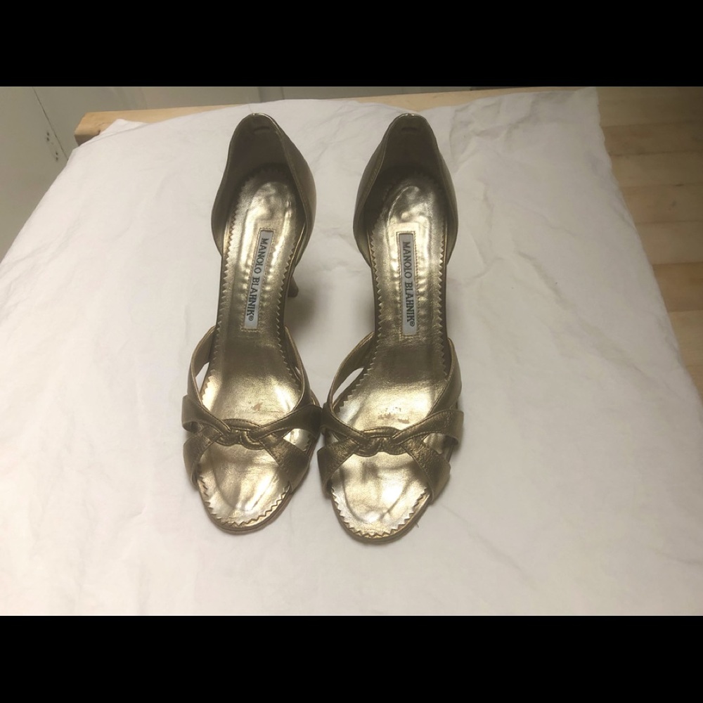 Gold tone Manolo Blahnik heels. Used condition. No box or dustbag.